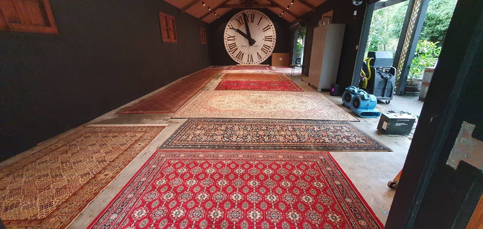 Area rugs laid out for specialist rug cleaning