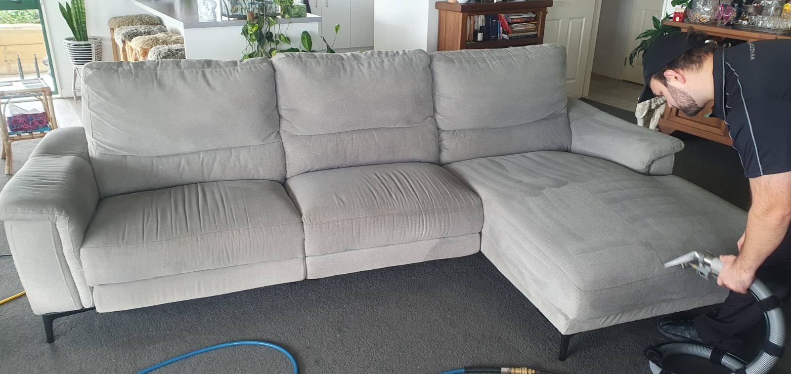 Clean upholstered sofa in a bright living room